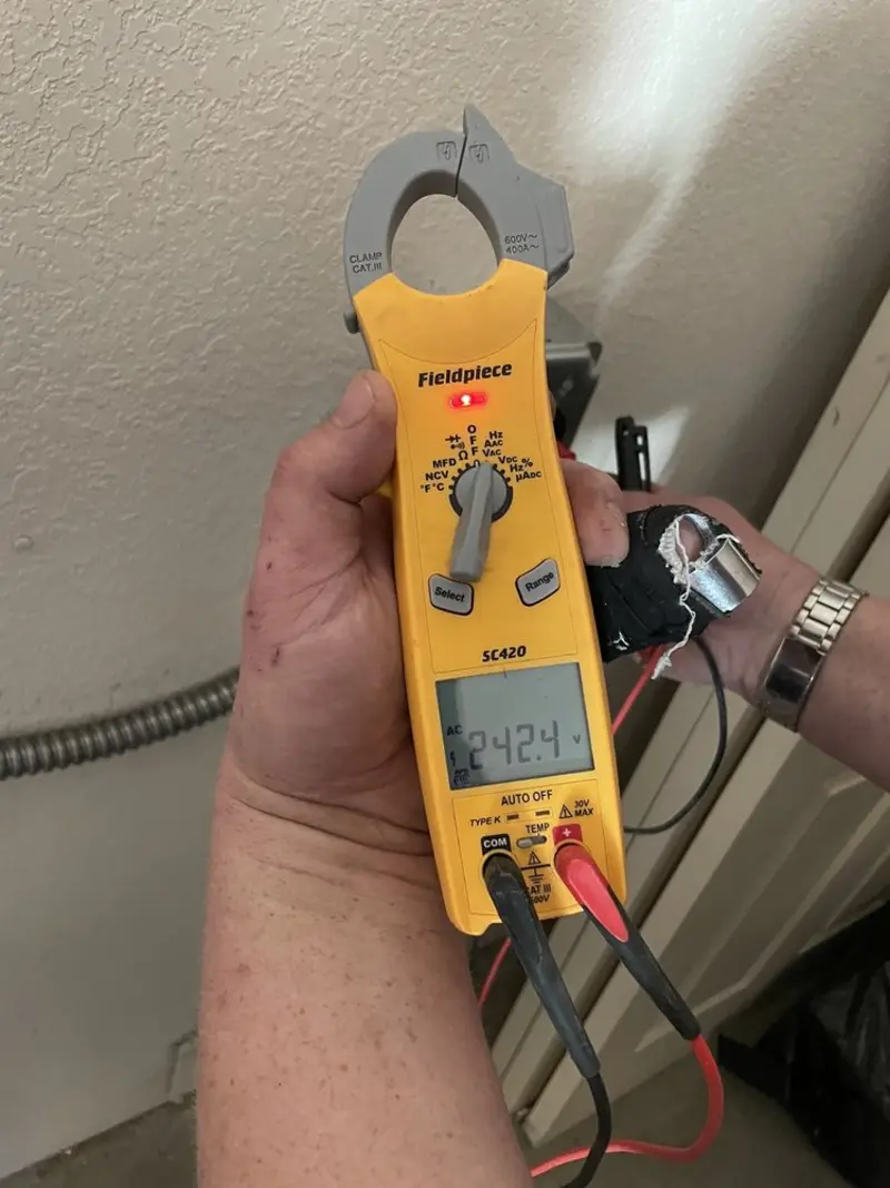 Voltage testing with clamp meter during Hot Tub / Pool Electrical Wiring in Mansfield